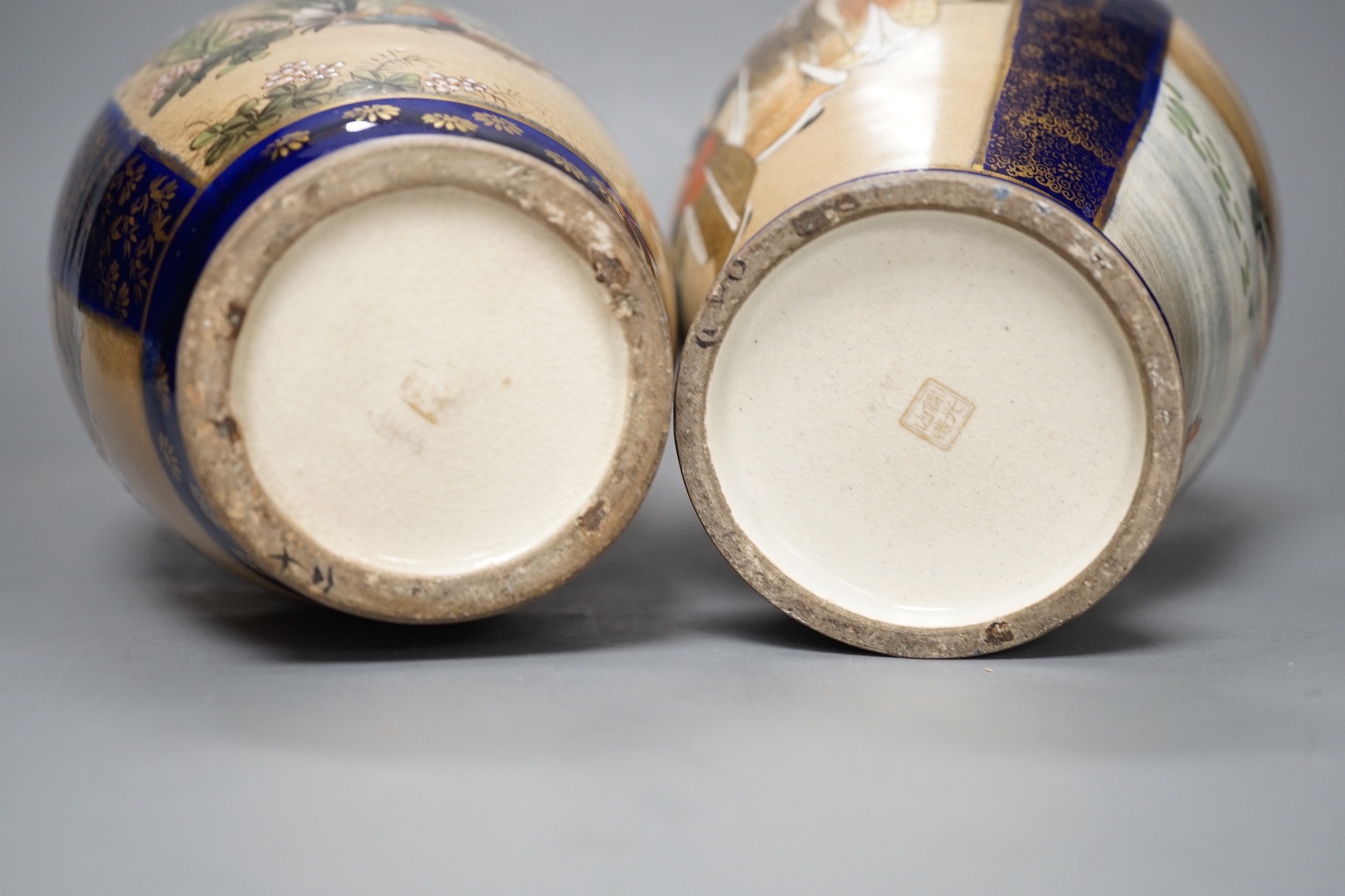 A pair of Japanese Satsuma pottery vases, one signed Kinkozan - 25cm high